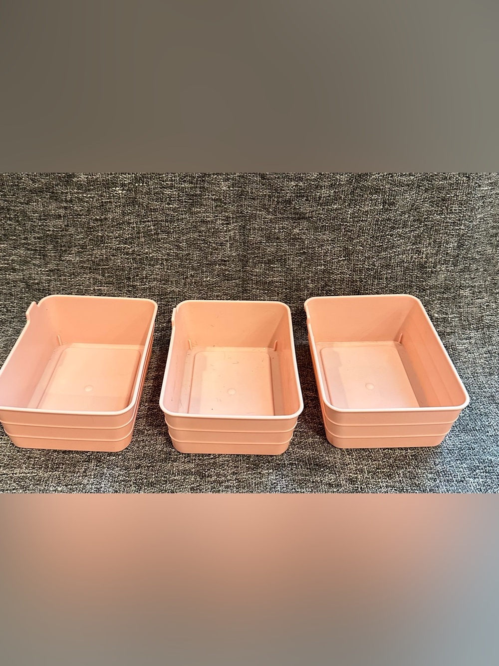3 soft plastic containers